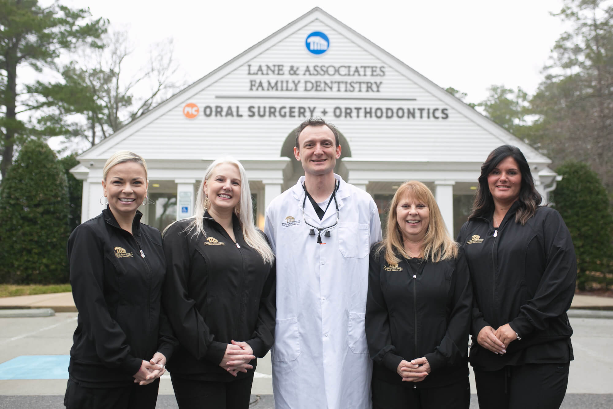 Dental staff at Southern Pines NC standing outside with doctor