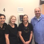 Volunteers smiling at Wake Smiles NC