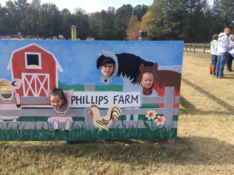 Phillips Farm Cary face in hole sign