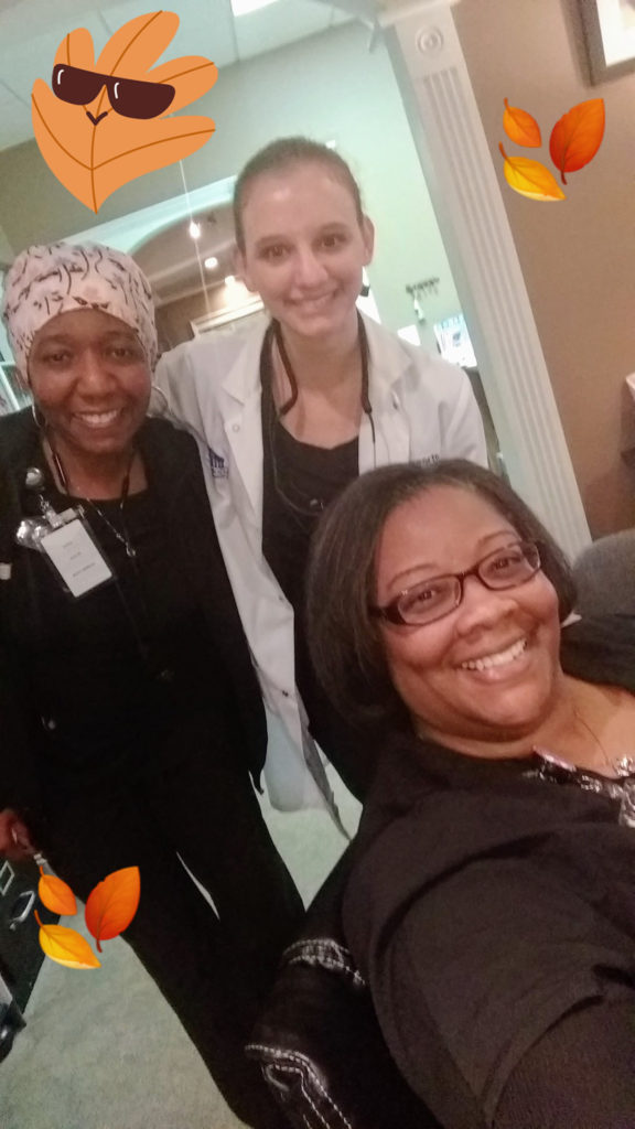 Smiling Raleigh Dental staff selfie