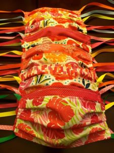 row of medical fabric masks, all colors