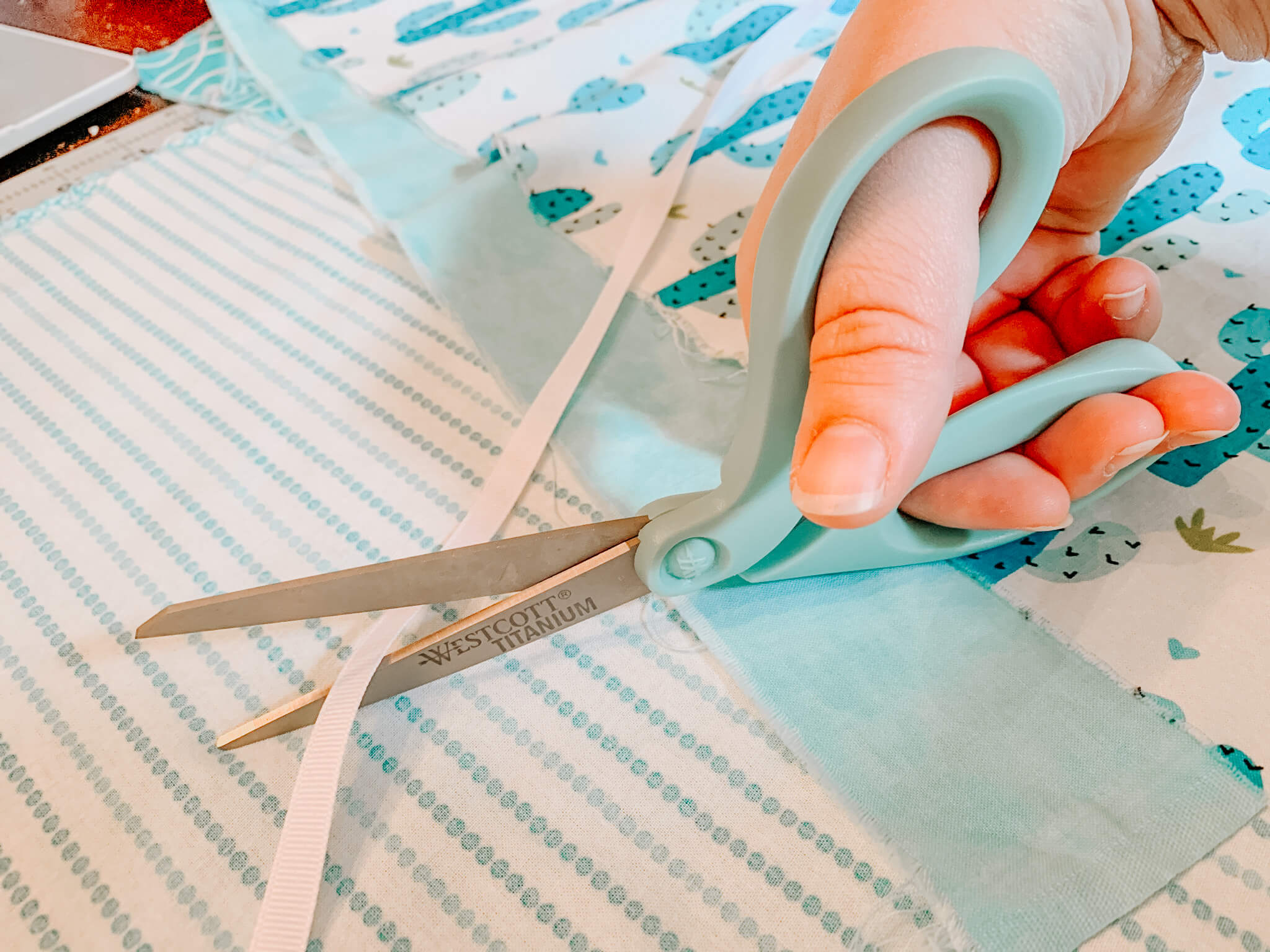 cutting out ribbons for healthcare face masks