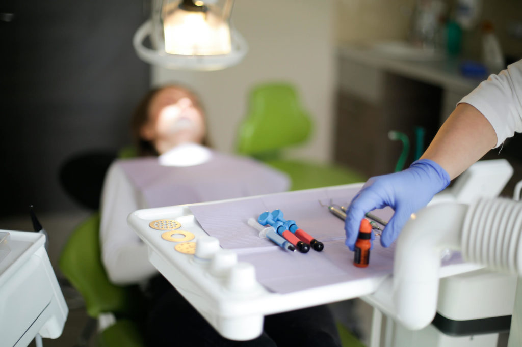 closeup on dental tray during treatment
