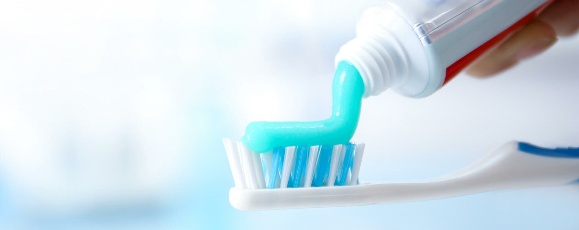 toothpaste on toothbrush