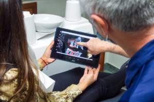 doctor pointing at dental xray