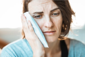 Woman with mouth pain